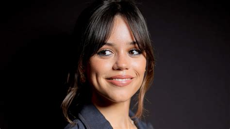 Download Jenna Ortega Smiling Portrait Wallpaper Wallpapers Com