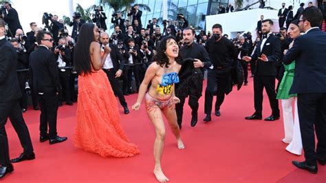 Topless Woman Removed From Cannes Red Carpet After Pro Ukraine Protest